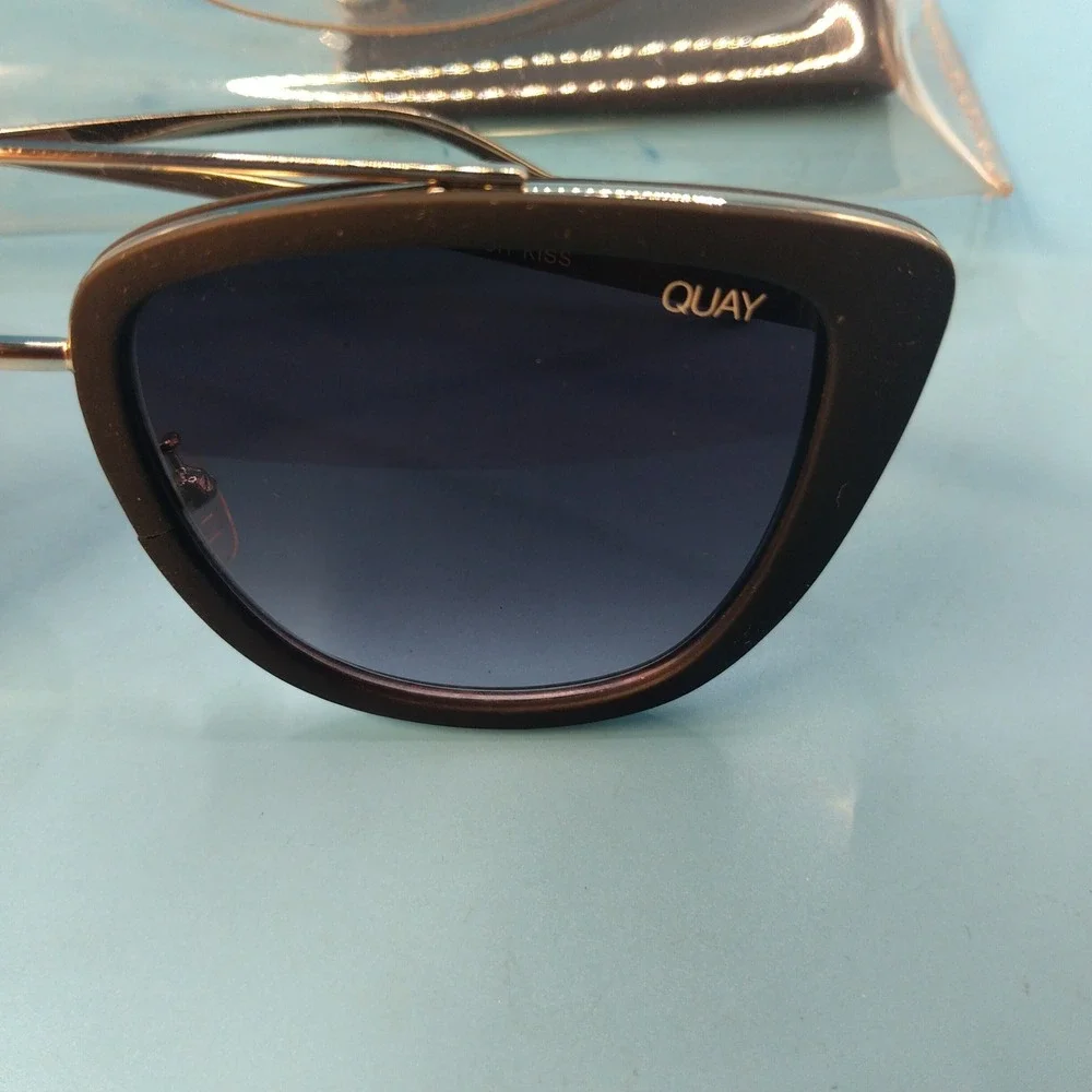 Quay Australia x Desi Perkins French Kiss Sunglasses Black Gold Cat Eye Flat Les